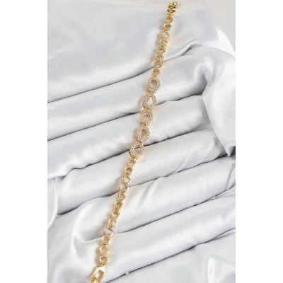 BUĞZ Pirinç Zirkon Taşlı Oval Model Gold Renk Kadın Bileklik - Lisinya