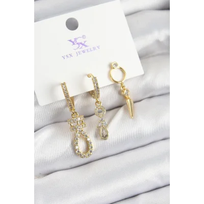 BUĞZ Pirinç Zİrkon Taşlı Sallantılı Model Gold Renk 3lü Kadın Küpe