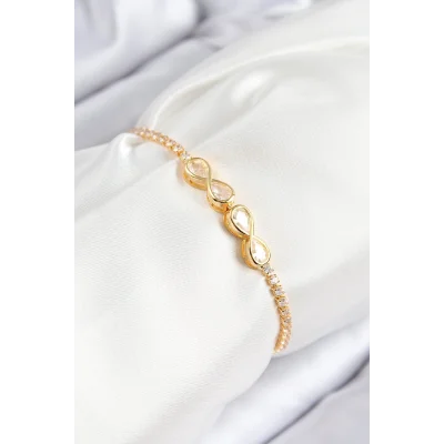 BUĞZ Pirinç Zirkon Taşlı Sonsuzluk Model Gold Renk Asansörlü Kadın Bileklik