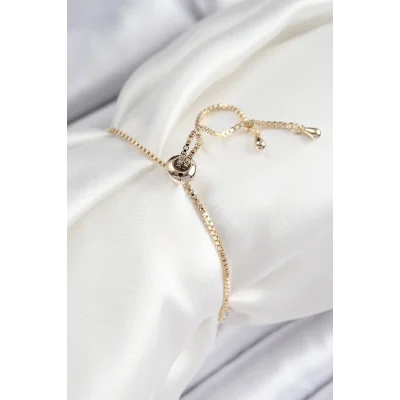 BUĞZ Pirinç Zirkon Taşlı X Detaylı Su Yolu Model Gold Renk Asansörlü Kadın Bileklik - Lisinya