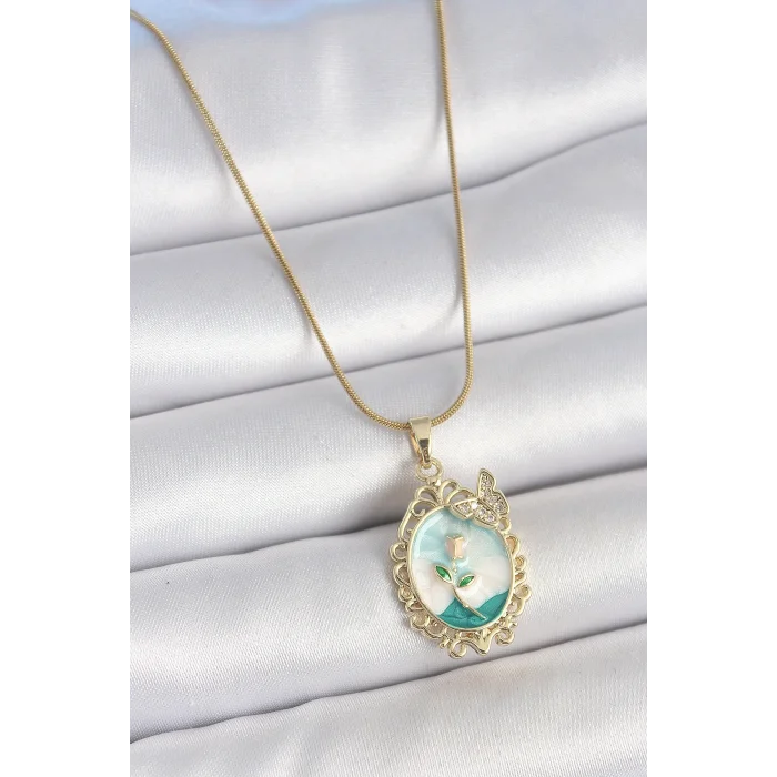 BUĞZ 316L Çelik Gold Renk Zincir Mavi Mineli Çiçek İşlemeli Zirkon Taş Detaylı Portre Model Kadın Kolye