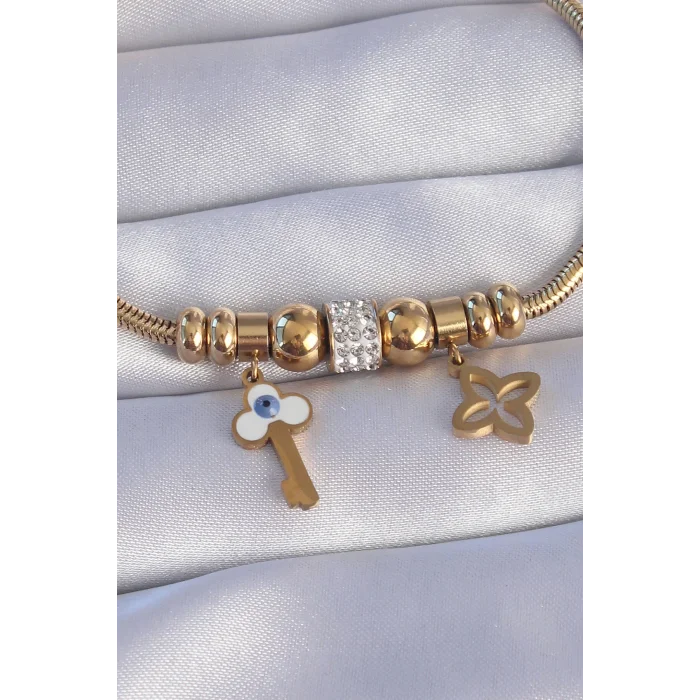 BUĞZ 316L Çelik Gold Renk Zirkon Taşlı Yonca Detay Nazarlı Anahtar Tasarımlı Bileklik - Lisinya