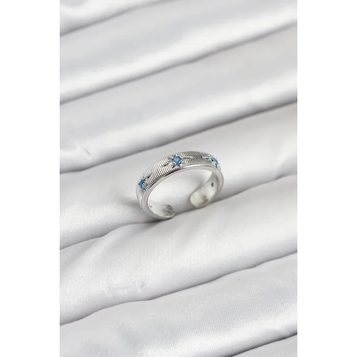 BUĞZ Pirinç Gümüş Renk Mavi Zirkon Taşlı Kutup Yıldızı Model Kadın Yüzük