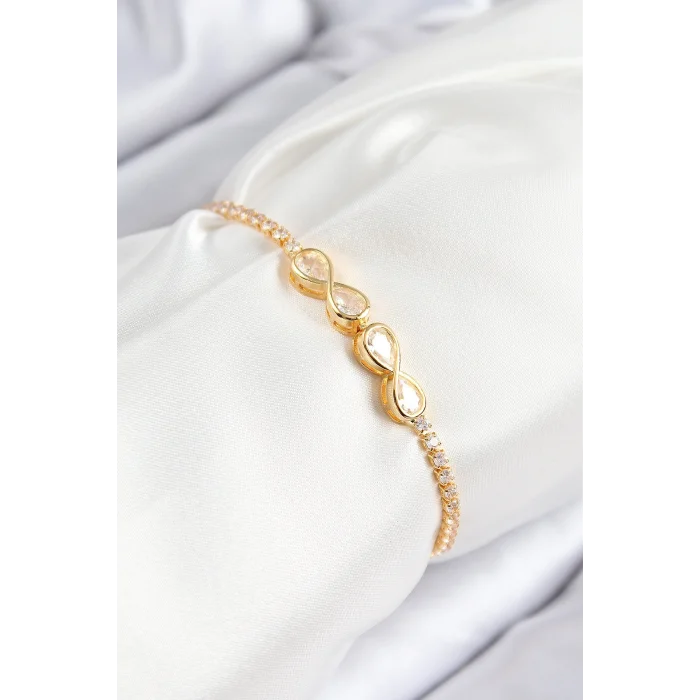 BUĞZ Pirinç Zirkon Taşlı Sonsuzluk Model Gold Renk Asansörlü Kadın Bileklik