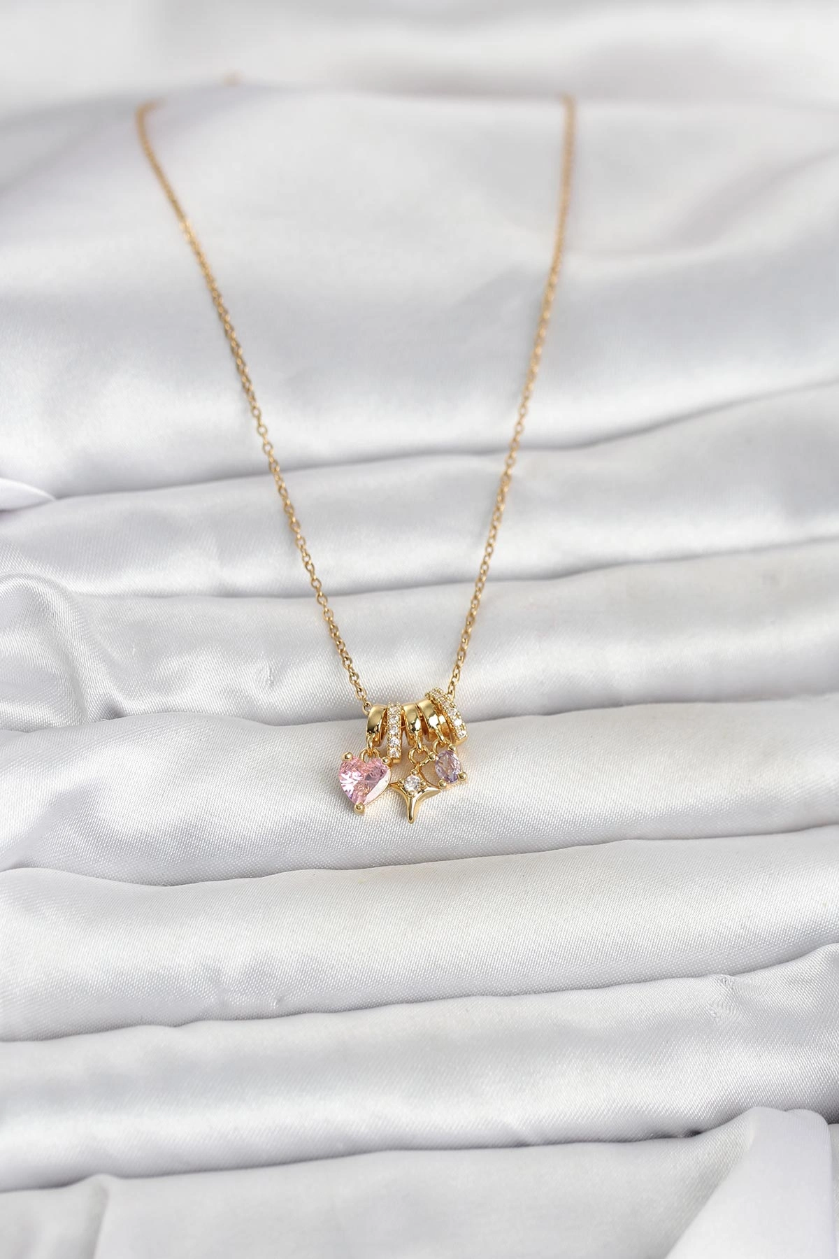 BUĞZ 316L ÇELİK GOLD PEMBE ZİRKON TAŞLI CHARMLI KADIN KOLYE - BUĞZ BUĞZ 316L ÇELİK GOLD PEMBE ZİRKON TAŞLI CHARMLI KADIN KOLYE - BUĞZ