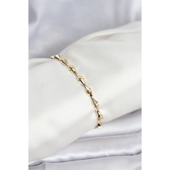 Pirinç Gold Renk VIP Seri Kemik Model Zirkon Taşlı Kadın Bileklik
