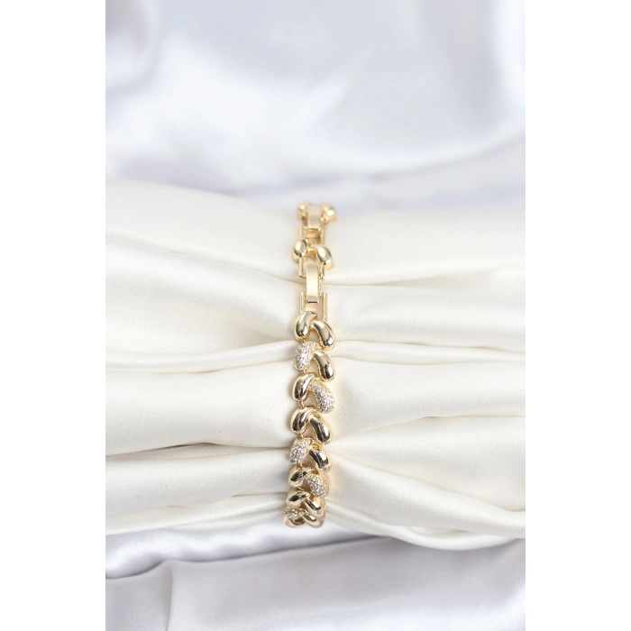 Pirinç Gold Renk VIP Seri Sarmal Damla Model Zirkon Taşlı Kadın Bileklik