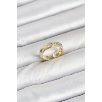 Pirinç Gold Renk Mavi Zirkon Taşlı Kutup Yıldızı Model Kadın Yüzük