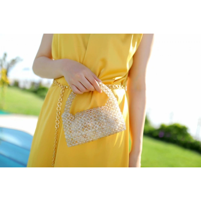 El yapımı incili el çantası kapaklı krem