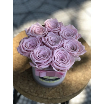 Pink Shocked Rose in White Glass Vase