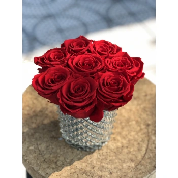 Red Shocking Roses in a Crystal Glass Vase