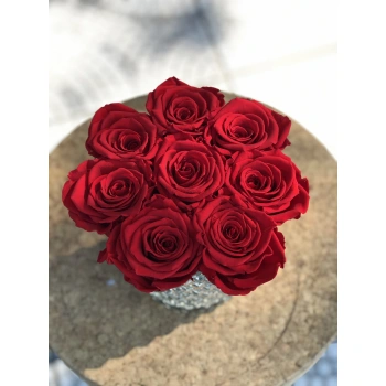 Red Shocking Roses in a Crystal Glass Vase