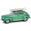 Greenlight 1/64 The Hobby Shop Series 16 - 1946 Ford Fordor Super Deluxe Green Metallic with White Interior and Roof Rack with Surfboards