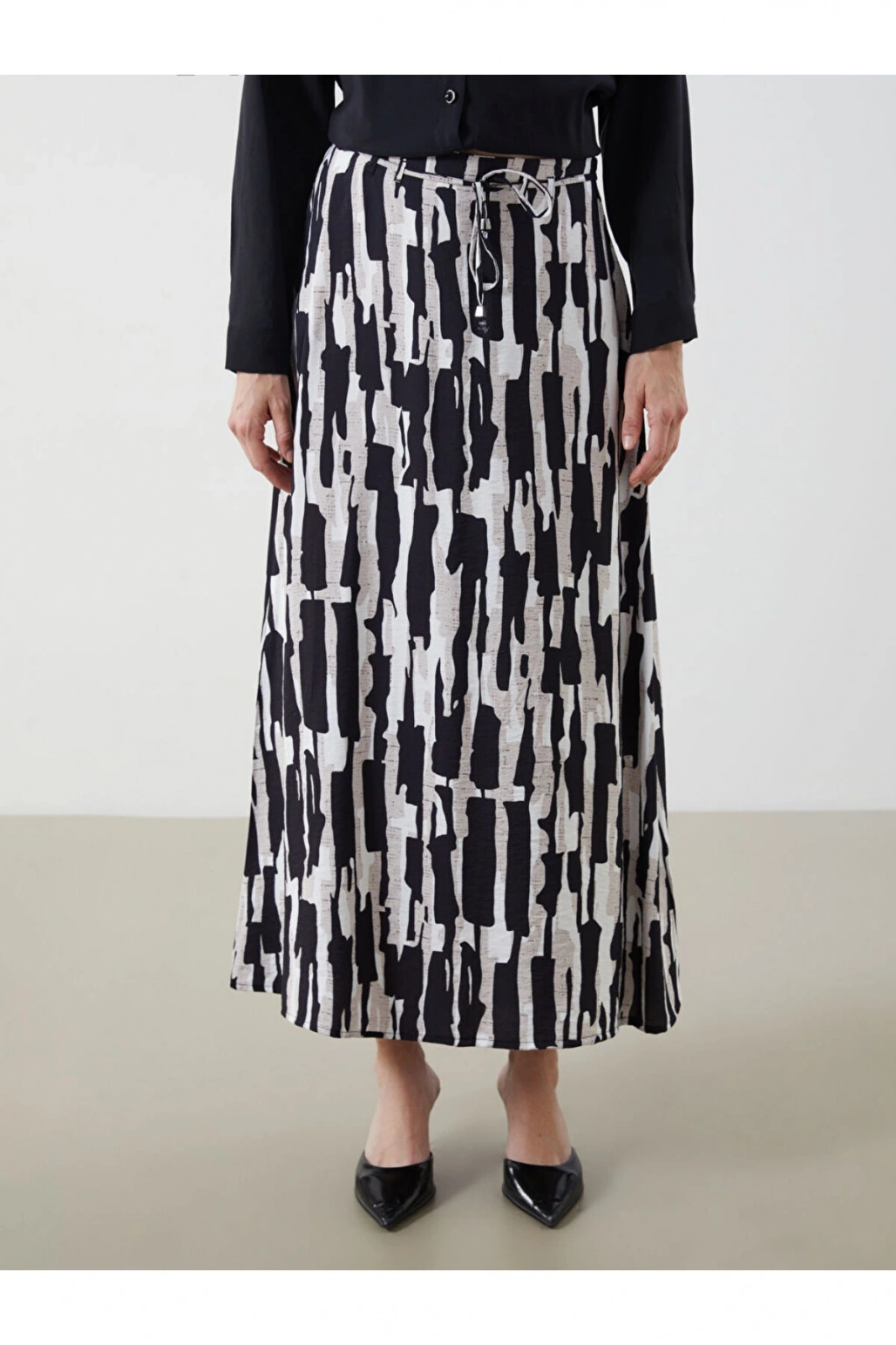 LCW Beli Lastikli Desenli Etek