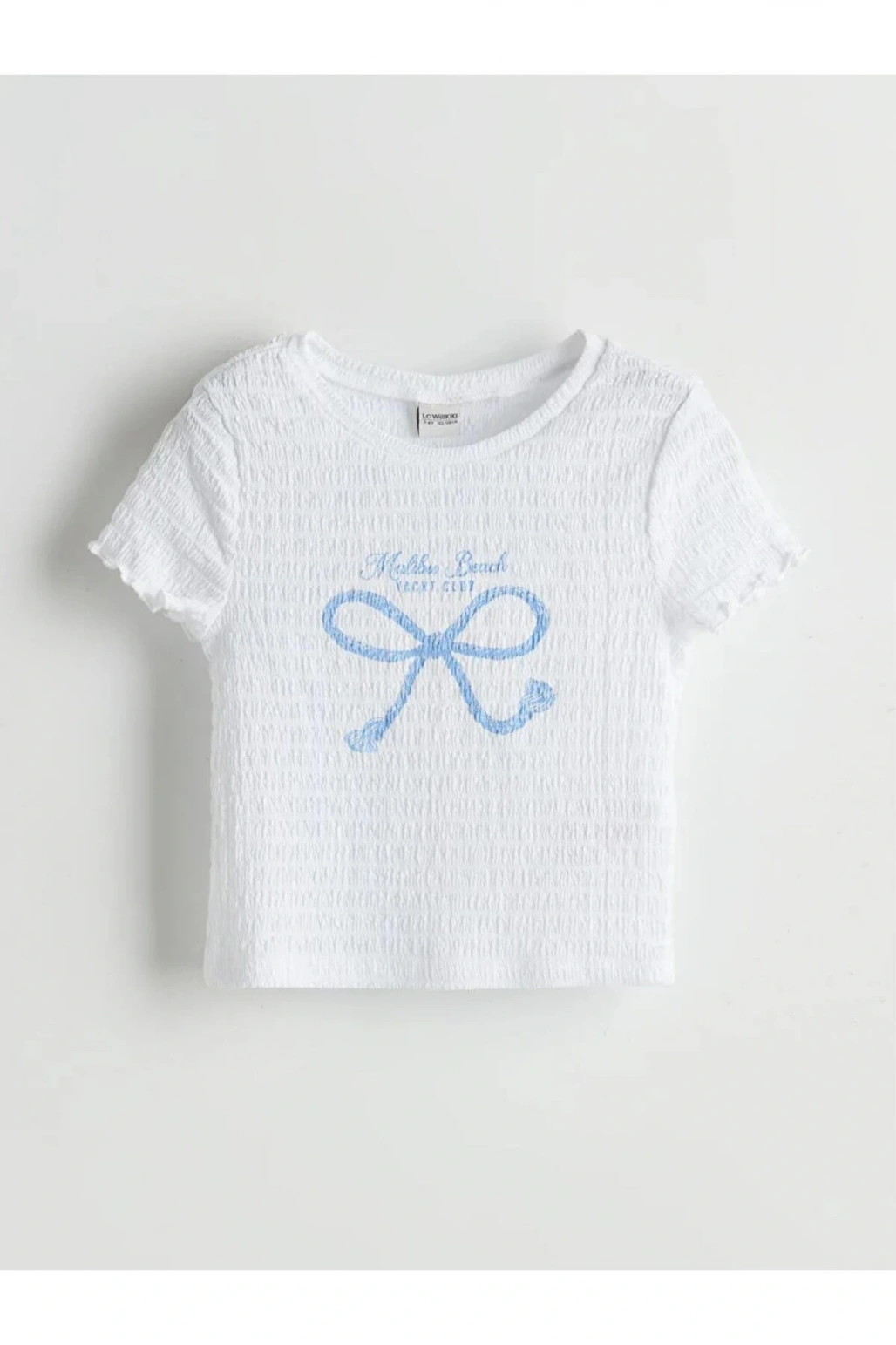 LCW Kids Beyaz Bisiklet Yaka Fiyonk Baskılı Kız Çocuk Crop Tişört