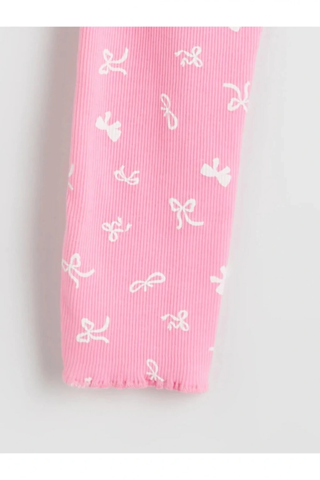 LCW Kids Pembe Bisiklet Yaka Fiyonk Baskılı Kız Çocuk Pijama Takımı