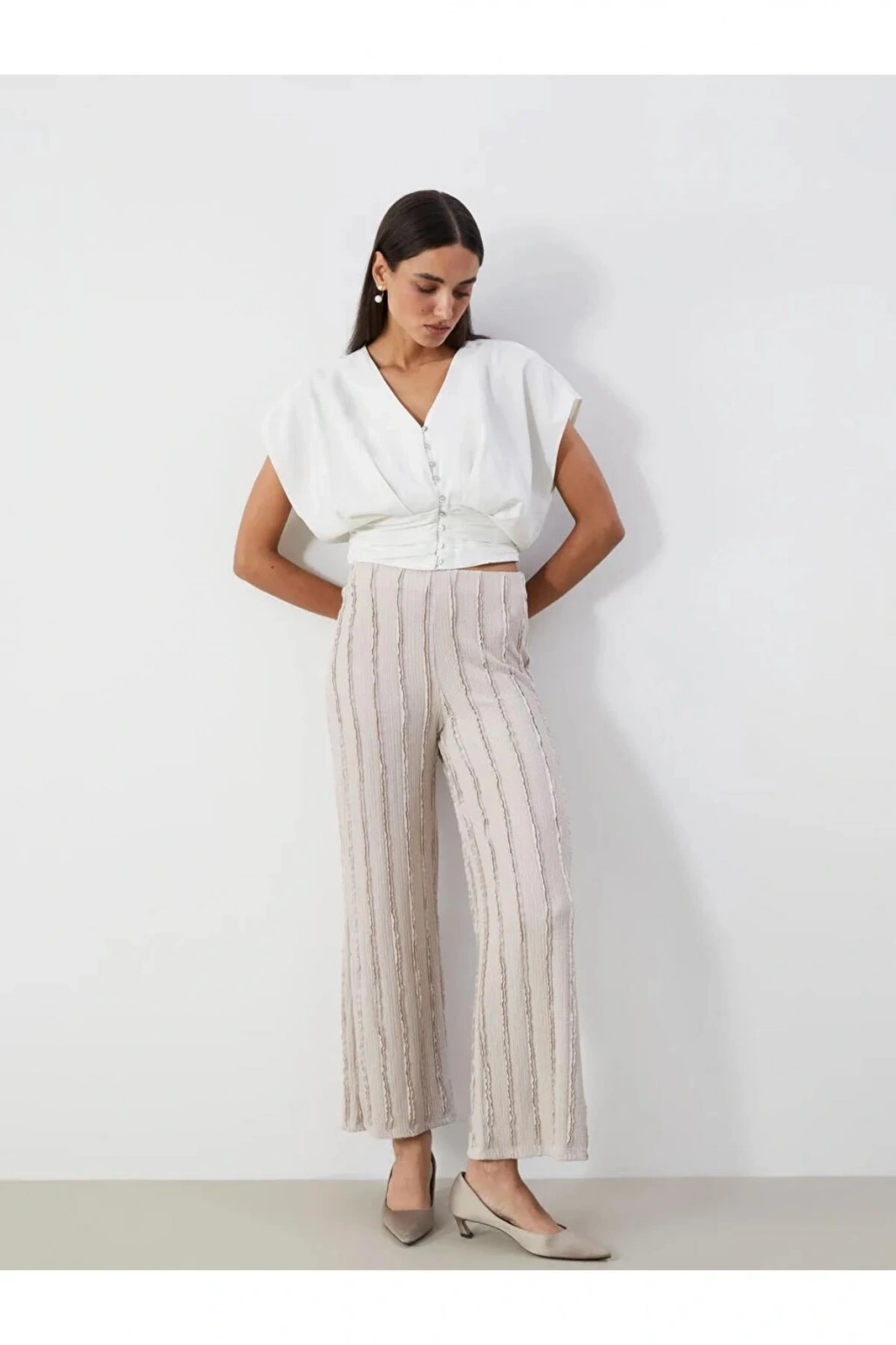 LCWAIKIKI Classic BEJ Beli Lastikli Dokulu Geniş Paça Kadın Pantolon