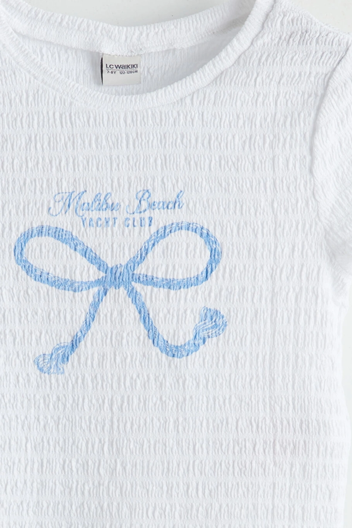 LCW Kids Beyaz Bisiklet Yaka Fiyonk Baskılı Kız Çocuk Tişört