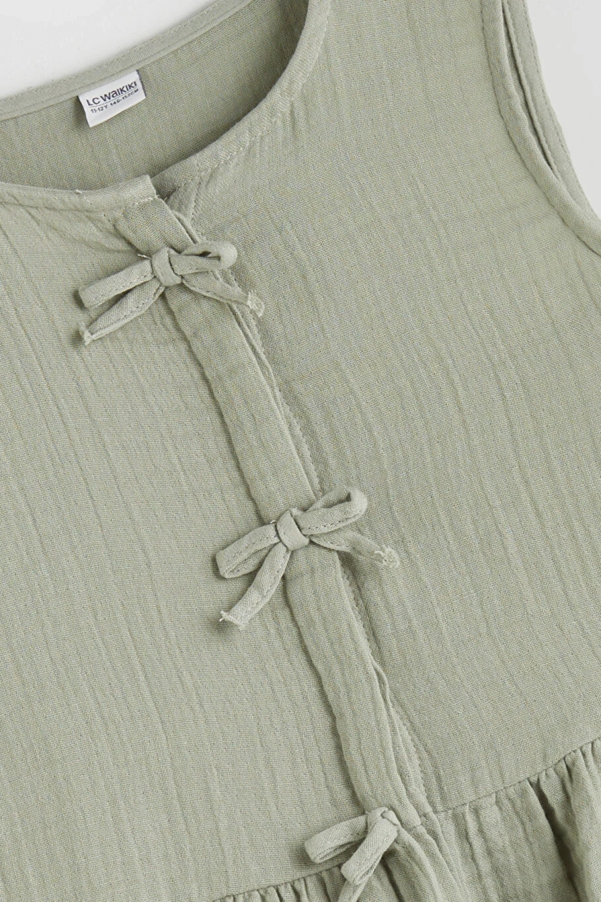 LCW Kids Haki Bisiklet Yaka Fiyonk Detaylı Kız Çocuk Bluz