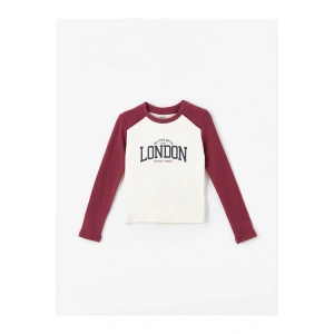 LCW Bisiklet Yaka Baskılı Uzun Kollu Kız Çocuk Tişört