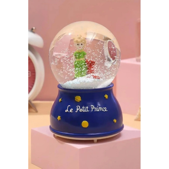 Pilli Işıklı Müzikli Kar Küresi–Le Petit Küçük Prens Figürlü Eğlenceli Masaüstü Biblo, LED Aydınlatmalı Dekoratif Hediyelik Kar Küresi
