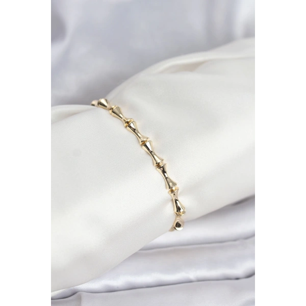 Pirinç Gold Renk VIP Seri Kemik Model Zirkon Taşlı Kadın Bileklik