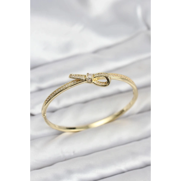 Pirinç Gold Renk Zirkon Taşlı Fiyonk Model Kadın Kelepçe Bileklik