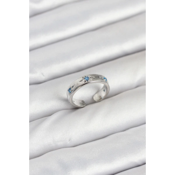 Pirinç Gümüş Renk Mavi Zirkon Taşlı Kutup Yıldızı Model Kadın Yüzük