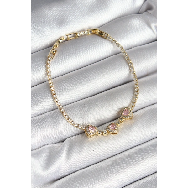 Pirinç Sıralı Pembe Kalp Figürlü Zirkon Taşlı Gold Renk Kadın Bileklik
