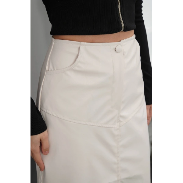 Yırtmaçlı uzun deri etek krem