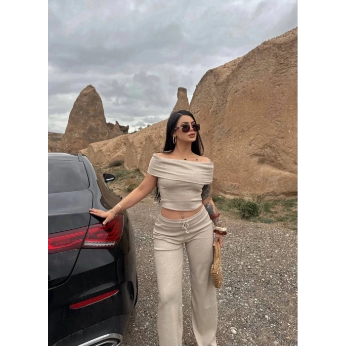 Madonna yaka bol paça pantolonlu takım