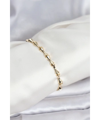 Pirinç Gold Renk VIP Seri Kemik Model Zirkon Taşlı Kadın Bileklik
