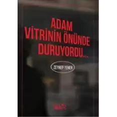 Adam Vitrinin Önünde Duruyordu