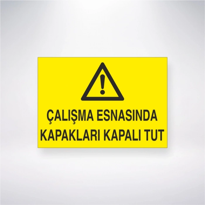 Çalışma Esnasında Kapakları Kapalı Tut Sticker 20X28 Cm