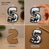 S Harf Yılbaşı Süsü – MDF Çam Ağacı Desenli Asılabilir Dekor (5x5 cm)