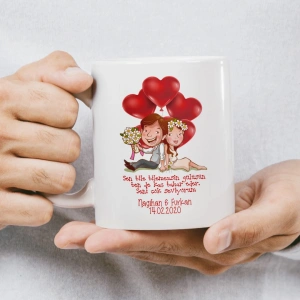 ALL YOU NEED IS LOVE yazısının kalp ve ok figürleriyle süslendiği kupa baskısı.