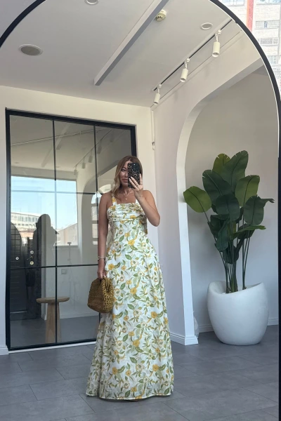 SARI ÇİÇEKLİ OMUZDAN BAĞLAMALI ELBİSE