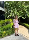 PEMBE KEMERLİ ETEĞİ KATLI ELBİSE