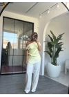 SARI TEK OMUZ BROŞLU BLUZ