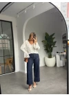 BEYAZ V YAKA TRİKO HIRKA
