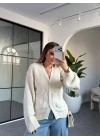 KREM ÜÇ DÜĞMELİ TRİKO HIRKA