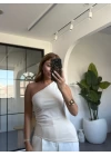 TAŞ YANI BÜZGÜLÜ TEK OMUZ BLUZ