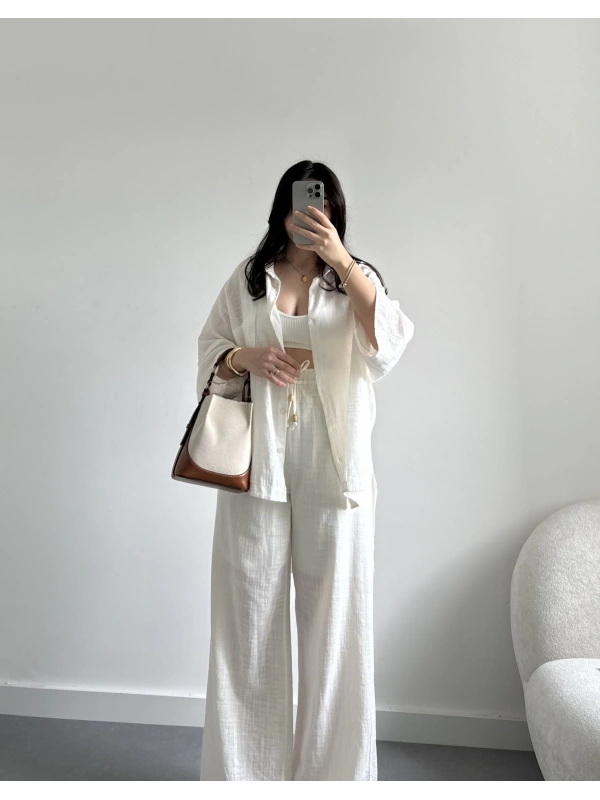 Arkası uzun beyaz gömlek