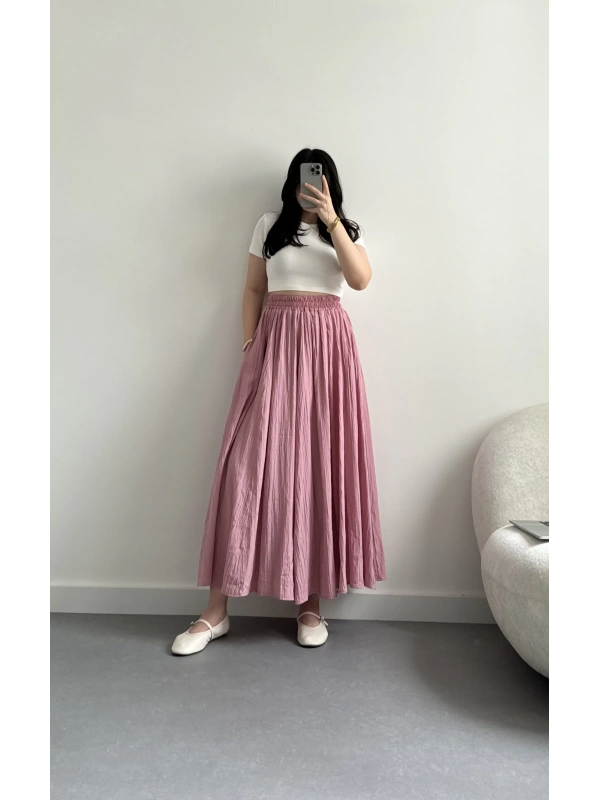 Pembe kırinkıl kumaş midi boy etek