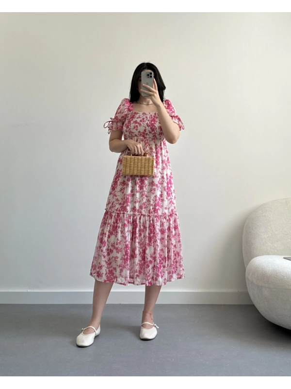 Pembe kolları vatkalı midi boy elbise