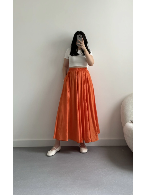 Turuncu kırinkıl kumaş midi boy etek