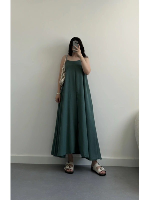 Zümrüt askılı elbise