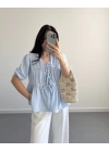 BEBE MAVİ ÖNDEN BÜZGÜLÜ YARIM KOL BLUZ