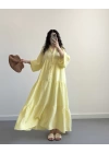 ELETA SARI MÜSLİN UZUN ELBİSE
