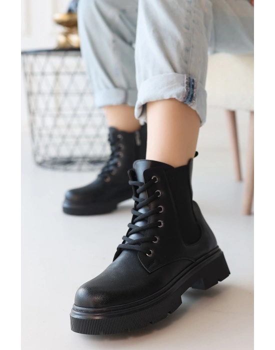 Daum Siyah Cilt Bağcıklı Kadın Bot